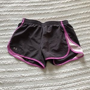 Black under armor running shorts.